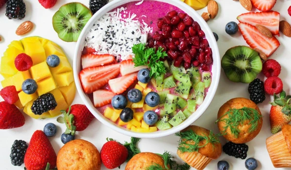 Table Covered In A Large Selection Of Healthy Fruits